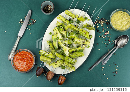 Vegetable celery skewers arrayed on a platter. Vegetable celery skewers arrayed on a platter. 131339516