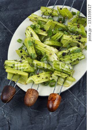 Vegetable celery skewers arrayed on a platter. Vegetable celery skewers arrayed on a platter. 131339517