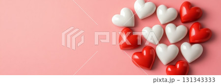 Red and white glossy hearts are arranged on a pink background, creating a larger heart shape, symbolizing love, valentine's day, and romance 131343333