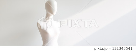 White female mannequin dressed in a white turtleneck top against a minimalist white background, featuring soft natural light for a clean, modern aesthetic 131343541