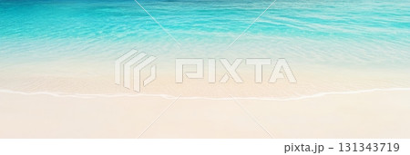 Soft waves gently lapping the shore of a pristine white sand beach create a serene and idyllic tropical paradise, perfect for a relaxing summer getaway Soft waves gently lapping the shore of a pristine white sand beach create a serene and idyllic tropical paradise, perfect for a relaxing summer getaway 131343719
