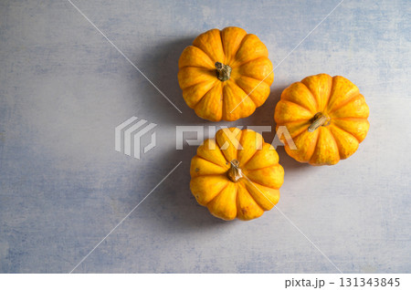 Autumn pumpkins squashes and leaves. Thanksgiving day or Halloween. Autumn frame background 131343845