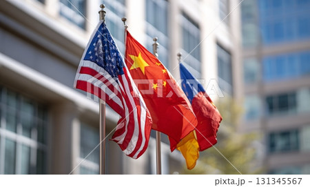 Flags of united states, china and venezuela waving together in front of a modern building, representing international relations, diplomacy, and global politics 131345567