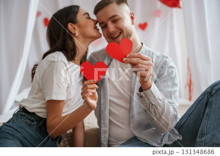 Festive decorations, Valentine's day. Young couple are together at home 131348686