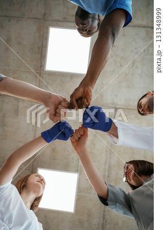 View from below of group of doctors View from below of group of doctors 131348999