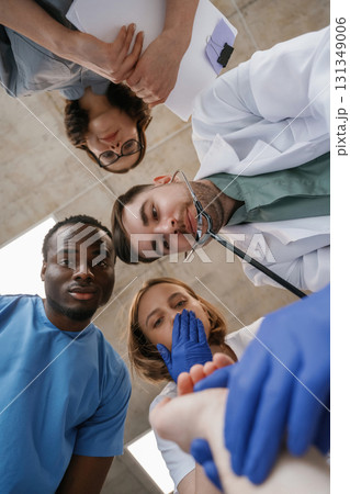 View from below of group of doctors 131349006