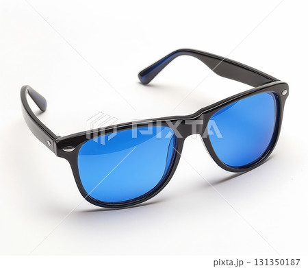 A pair of sunglasses with blue lenses A pair of sunglasses with blue lenses 131350187