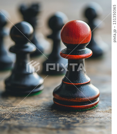 A black and red chess piece is the only one on the board A black and red chess piece is the only one on the board 131350365