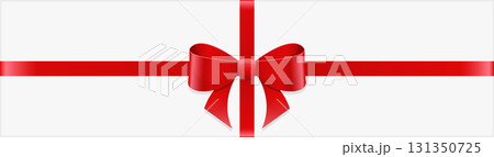 A vibrant red ribbon crisscrosses a pristine white background, tied into a beautiful bow at the center. 131350725