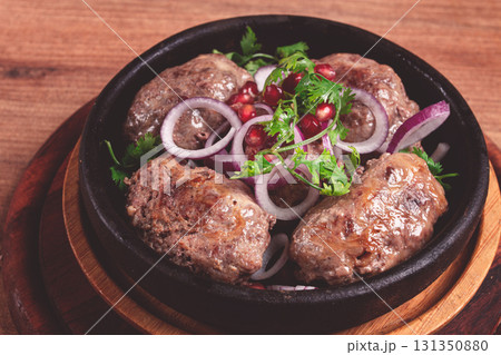 fried apkhazura, cutlet in a fat grid, spicy, Georgian dish, fried on ketsi, homemade, no people, 131350880