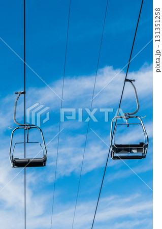 Chair Lift above the mountains and green forest of Bulgaria. Eco tourism. Tourist attraction. Seven Rila lakes. Cable car in Rila Mountains 131351258