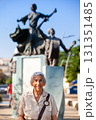 Senior woman traveling at the Ronda del Sinu linear park of Monteria in the department of Cordoba, Colombia. 131351485
