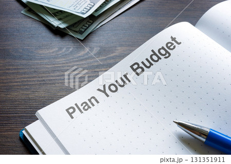 Notebook plan your budget. Money management. 131351911