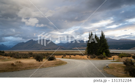Wonderful landscape panorama with mountains and colorful sunrise cloudscape above them, New Zealand Wonderful landscape panorama with mountains and colorful sunrise cloudscape above them, New Zealand 131352284