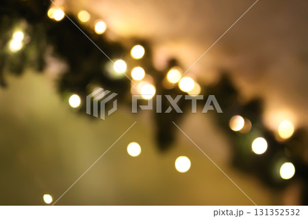 Festive illuminated interior in warm holiday interior setting. 131352532