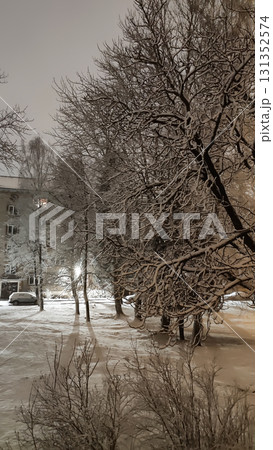Snow-covered street with urban architecture in Riga. Snow-covered street with urban architecture in Riga. 131352574