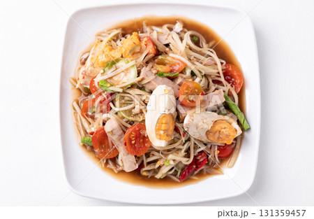 Thai food (Som Tum), Spicy papaya salad with steamed pork sausage and salted egg 131359457