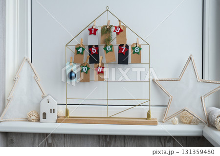 Traditional twenty four days advent calendar before Christmas holidays. Plastic free zero waste sustainable decoration. Winter cozy home Catholic traditions of Christmas countdown new year 131359480