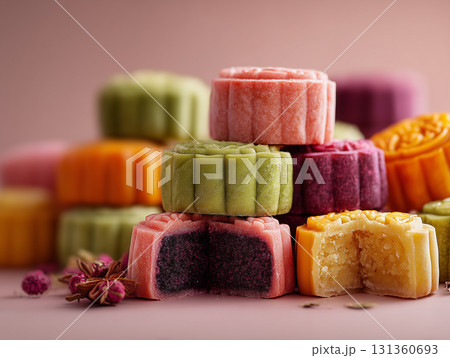 Colorful mooncakes with smooth textures on beige background Colorful mooncakes with smooth textures on beige background 131360693