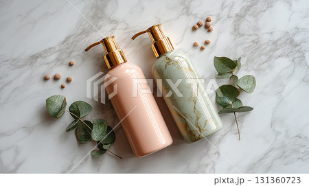 Elegant shampoo and conditioner bottles on marble surface 131360723