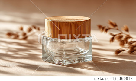 Glass jar with bamboo lid on beige surface 131360818