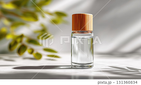 Glass bottle with wooden cap on white background 131360834