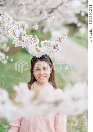 Woman tourist sightseeing Kajo Park Yamagata Castle Ruins with Sakura Cherry Blossom in Spring, happy traveler travel in Yamagata prefecture, Tohoku, Japan. famous Landmark for Travel and Vacation Woman tourist sightseeing Kajo Park Yamagata Castle Ruins with Sakura Cherry Blossom in Spring, happy traveler travel in Yamagata prefecture, Tohoku, Japan. famous Landmark for Travel and Vacation 131361211