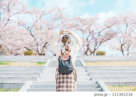 Woman tourist sightseeing Tendo Park or Maizuru Park with Sakura Cherry Blossom in Spring, happy traveler travel in Yamagata prefecture, Tohoku, Japan. famous Landmark for Travel and Vacation 131361216