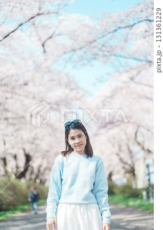 Woman tourist sightseeing Kitakami Tenshochi Park with Sakura Cherry Blossom in Spring, traveler travel in Kitakami festival, Iwate prefecture, Japan. Landmark for Travel and Vacation destination Woman tourist sightseeing Kitakami Tenshochi Park with Sakura Cherry Blossom in Spring, traveler travel in Kitakami festival, Iwate prefecture, Japan. Landmark for Travel and Vacation destination 131361229