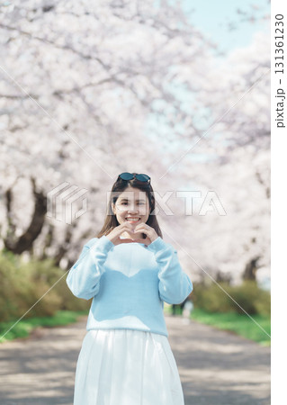 Woman tourist sightseeing Kitakami Tenshochi Park with Sakura Cherry Blossom in Spring, traveler travel in Kitakami festival, Iwate prefecture, Japan. Landmark for Travel and Vacation destination Woman tourist sightseeing Kitakami Tenshochi Park with Sakura Cherry Blossom in Spring, traveler travel in Kitakami festival, Iwate prefecture, Japan. Landmark for Travel and Vacation destination 131361230