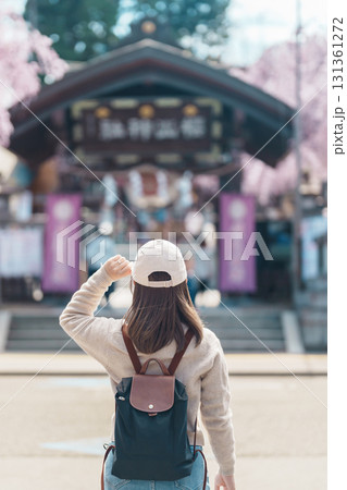 Woman tourist sightseeing Sakurayama Shrine with Cherry blossom in Spring season, happy traveler travel in Morioka city, Iwate prefecture, Japan. famous Landmark Travel and Vacation destination Woman tourist sightseeing Sakurayama Shrine with Cherry blossom in Spring season, happy traveler travel in Morioka city, Iwate prefecture, Japan. famous Landmark Travel and Vacation destination 131361272