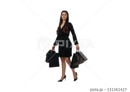 Woman happily carries bags on Black Friday, isolated, PNG 131361427