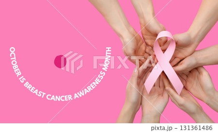 Hands come together to show support for breast cancer awareness 131361486