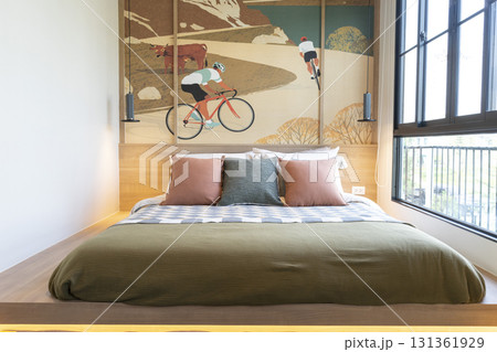 Bicycle wallpaper at the headboard of modern minimal bedroom. Bicycle wallpaper at the headboard of modern minimal bedroom. 131361929