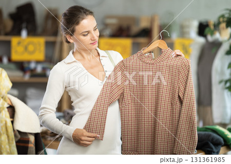 During November sales, woman choose and buy warm knitted dress During November sales, woman choose and buy warm knitted dress 131361985