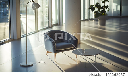 Chair and a table are in a room with a window Chair and a table are in a room with a window 131362087