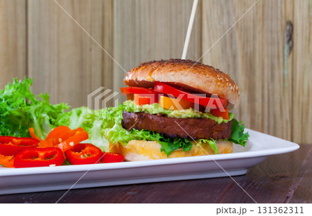Veggie burger with soybean rissole 131362311