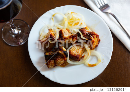 Grilled pork meat shashlik with sliced onion Grilled pork meat shashlik with sliced onion 131362914