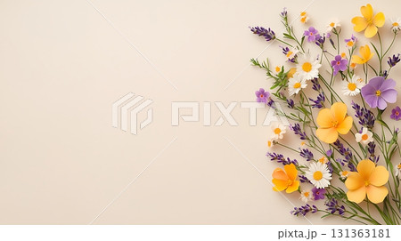 Vibrant Spring Floral Arrangement with Colorful Blooms on Soft Beige Background 131363181