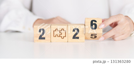 2025 year change to 2026 year block with jigsaw puzzle icon. Business Process, Team, teamwork, Goal, mission, Resolution, strategy, plan, Action, partnership, and New Year start 2025 year change to 2026 year block with jigsaw puzzle icon. Business Process, Team, teamwork, Goal, mission, Resolution, strategy, plan, Action, partnership, and New Year start 131363280
