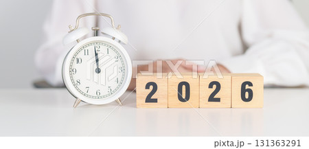Happy New Year 2026 with vintage alarm clock. Christmas, New Start, Resolution, countdown, Goals, Plan, Action and Motivation Concept 131363291