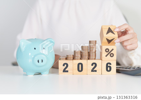 2026 New year with percentage change to UP and Down arrow with coin stack. Interest rate, GDP, stocks market, financial, deflation and Inflation, mortgage, debt, Loan and Economic Recession 2026 New year with percentage change to UP and Down arrow with coin stack. Interest rate, GDP, stocks market, financial, deflation and Inflation, mortgage, debt, Loan and Economic Recession 131363316