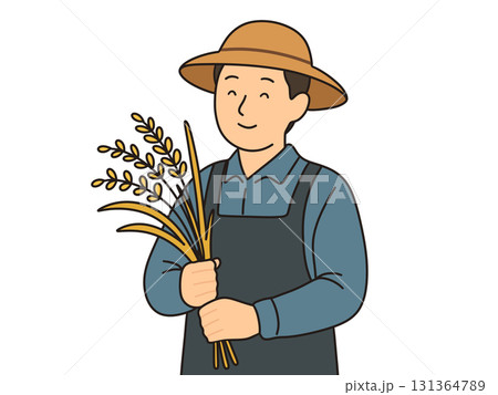 稲刈りをする男性、稲穂を持っている 稲刈りをする男性、稲穂を持っている 131364789