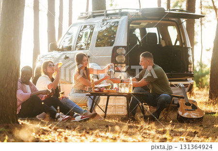 Group of friends are having fun together in the forest 131364924