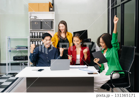 Multiracial group of young creative people in smart casual wear discussing business brainstorming meeting ideas design project. 131365171