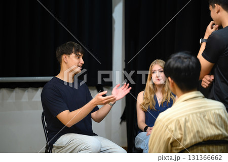 Diverse group of people sit together in a mental health support meeting Diverse group of people sit together in a mental health support meeting 131366662