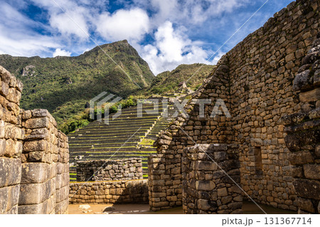 Panoramic view of Machu Picchu ruins with Huayna Picchu in background, Peru Panoramic view of Machu Picchu ruins with Huayna Picchu in background, Peru 131367714