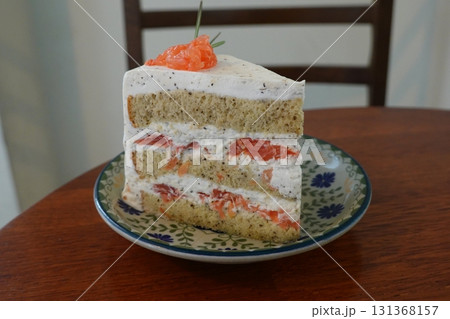 A delectable slice of cake with rich layers of cream and frosting, topped with fresh fruit or sprinkles. Perfect for dessert photography, showcasing indulgence and sweetness in food-related projects. A delectable slice of cake with rich layers of cream and frosting, topped with fresh fruit or sprinkles. Perfect for dessert photography, showcasing indulgence and sweetness in food-related projects. 131368157
