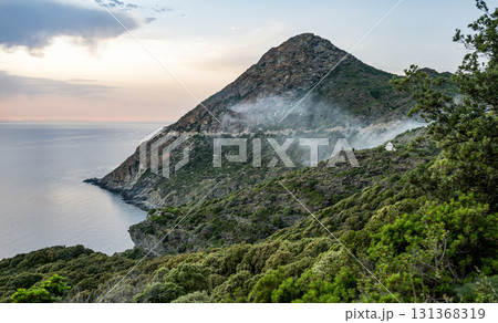 Coastline view Roadtrip Winding road along rocky coast of Cap Corse peninsula on Corsica island France 131368319