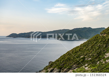 Coastline view Roadtrip Winding road along rocky coast of Cap Corse peninsula on Corsica island France 131368324